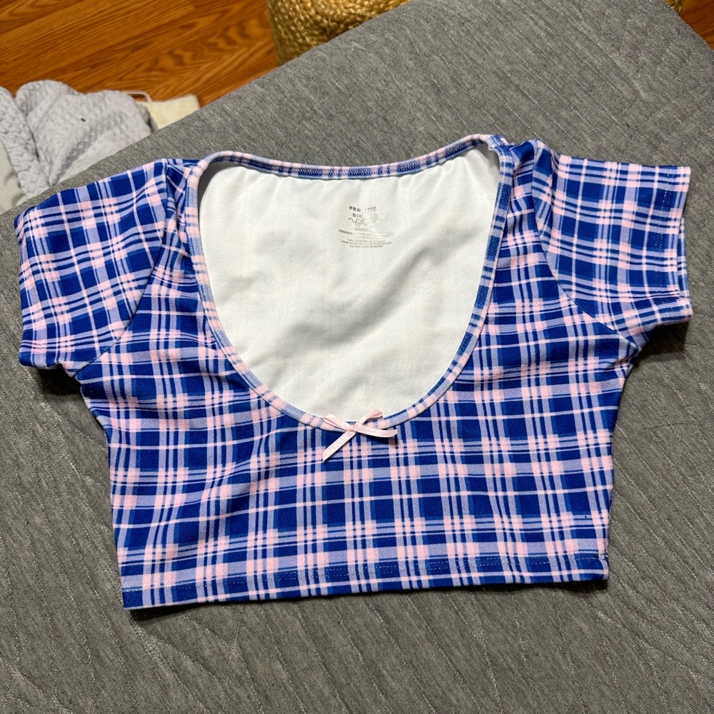 Frankie’s Bikinis blue and pink bikini top